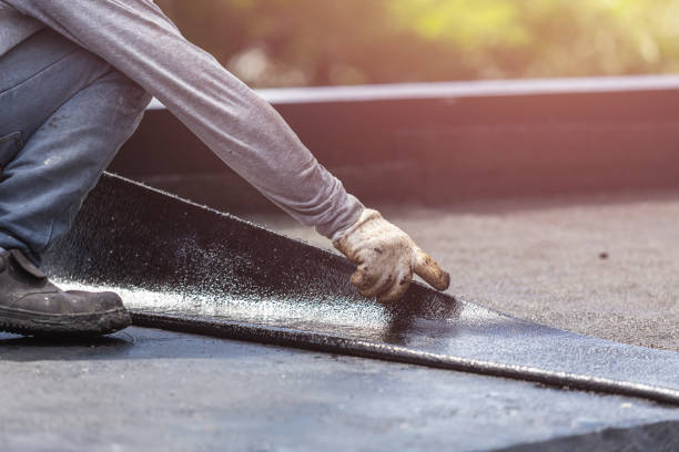 Professional Waterproofing technician working in Caldwell, OH